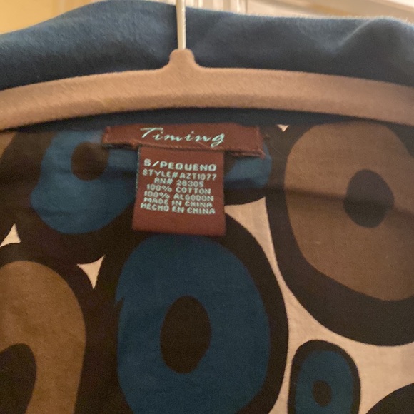 Timing Teal blue cropped jacket with bold geometric lining - Picture 2 of 5